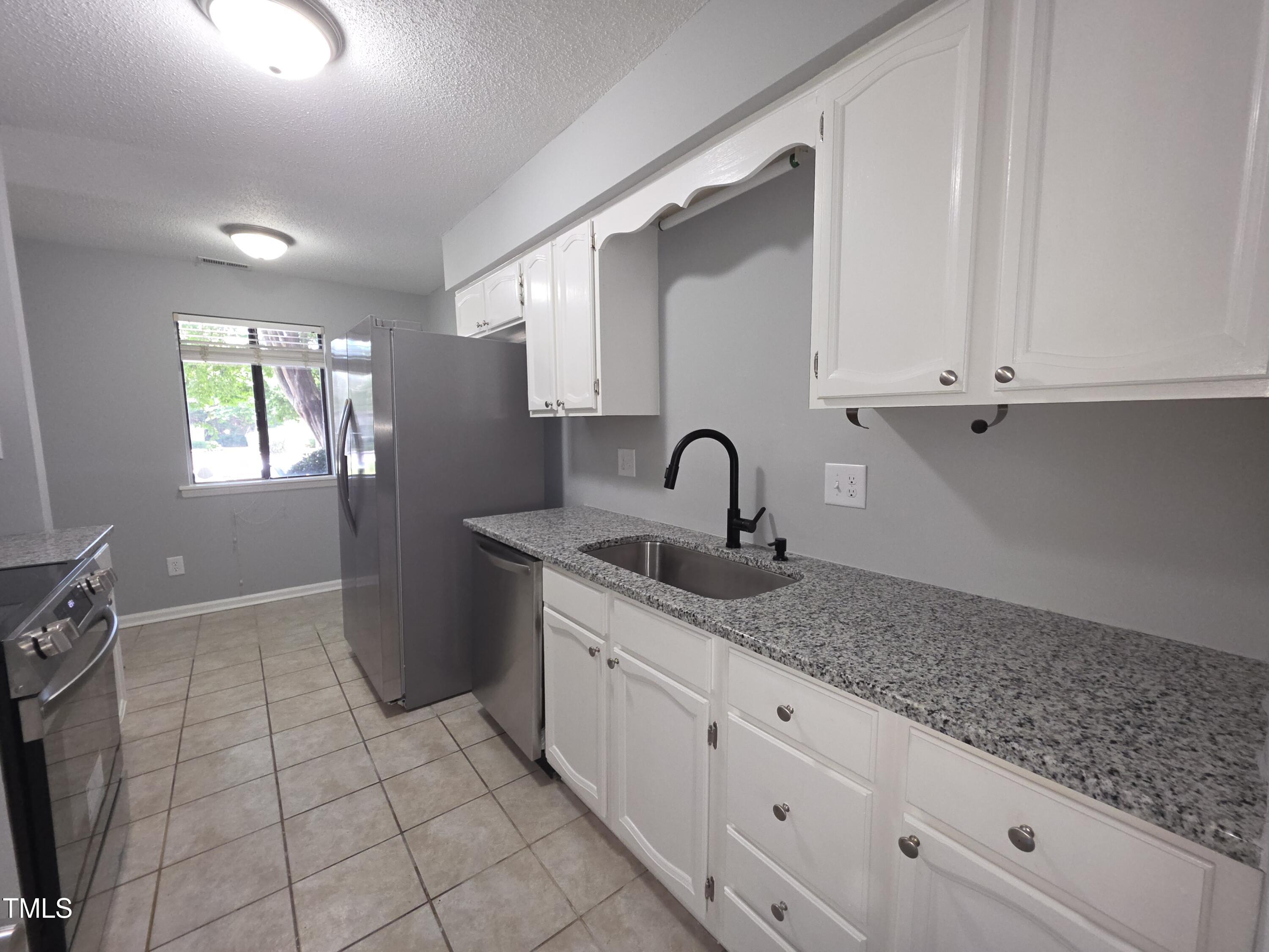 5893 Shady Grove Circle Raleigh, NC 27609 - Photo 3 of 34 20250619_123036