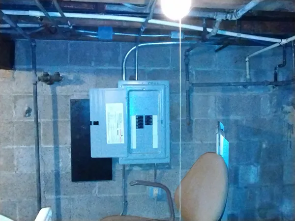 an aerial view of a residential apartment building with a yard