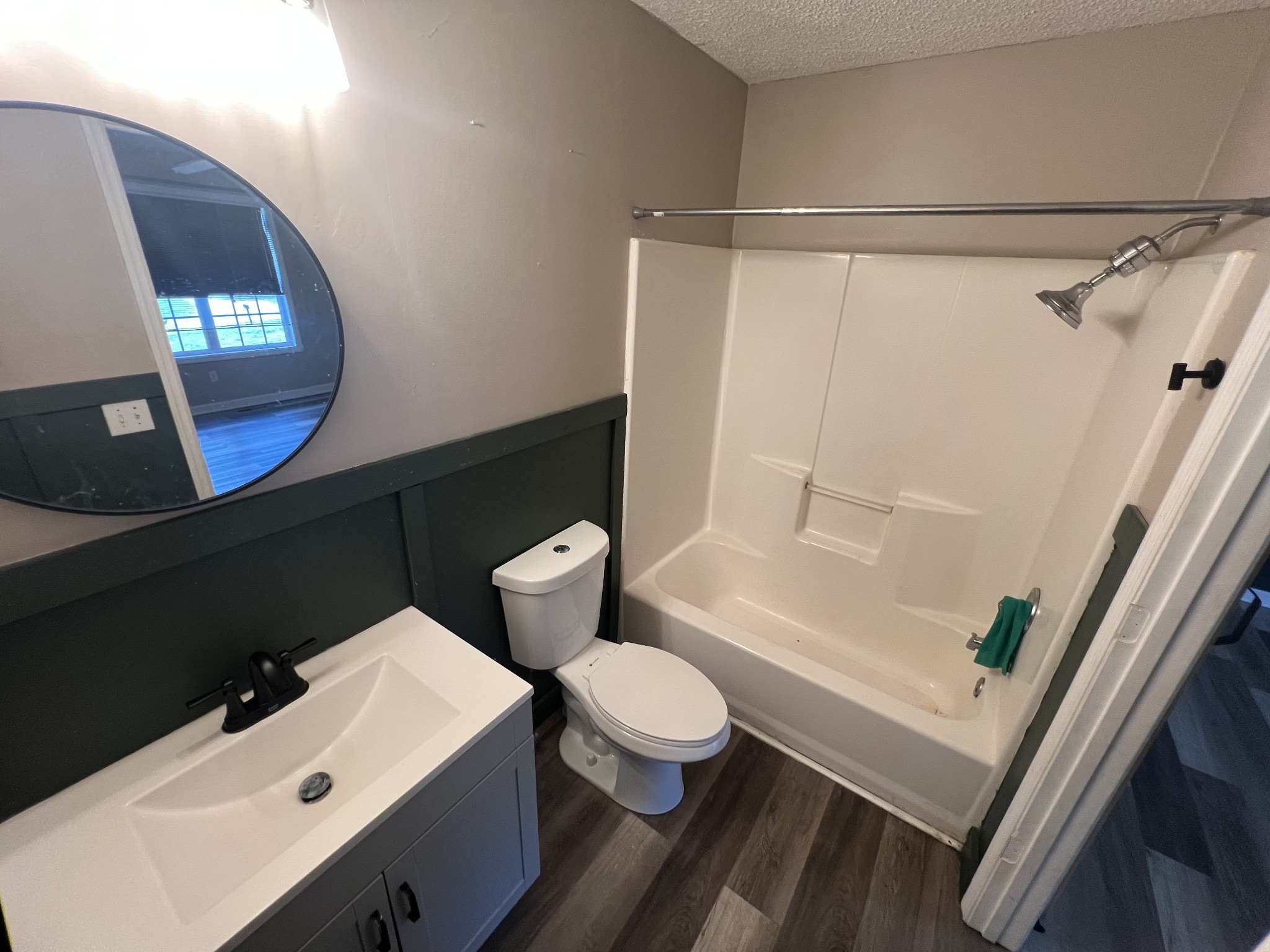 149 Hawthorne Street Pulaski, TN 38478 - Photo 17 of 33 a bathroom with a sink a toilet a mirror and shower