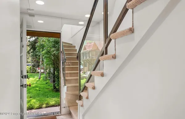 a view of entryway with stairs