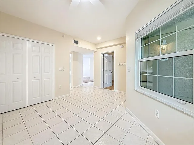 a kitchen with stainless steel appliances a refrigerator sink and cabinets
