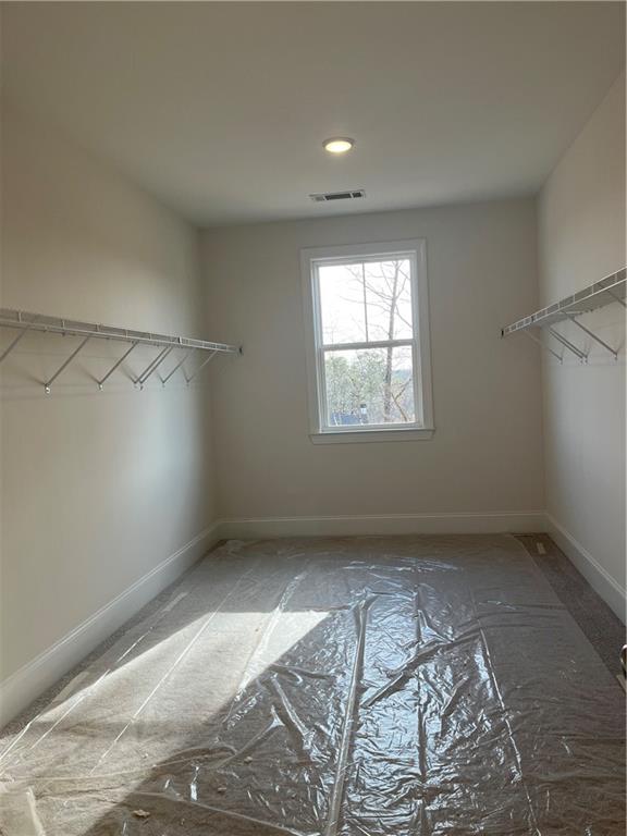 3745 Reserve Overlook Way Cumming, GA 30041 - Photo 39 of 87 a view of an empty room with a window