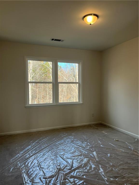 3745 Reserve Overlook Way Cumming, GA 30041 - Photo 51 of 87 an empty room with windows