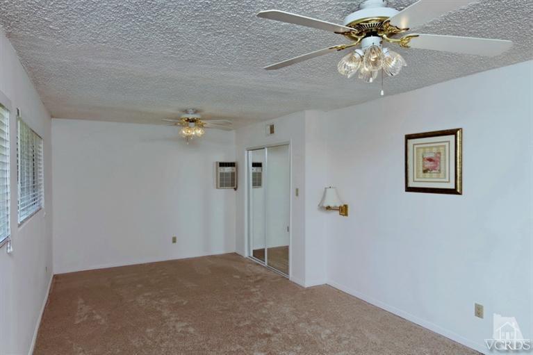 4553 Alpine Street Simi Valley, CA 93063 - Photo 15 of 25 a view of a livingroom with a chandelier fan