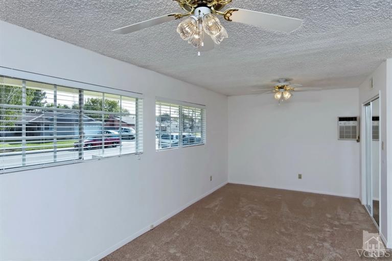 4553 Alpine Street Simi Valley, CA 93063 - Photo 18 of 25 a view of room with window and ceiling fan