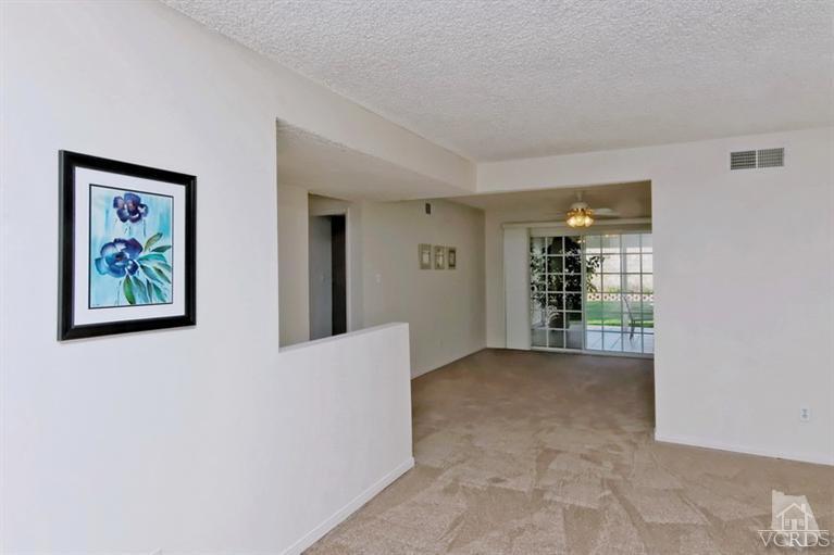 4553 Alpine Street Simi Valley, CA 93063 - Photo 3 of 25 a view of an empty room with a window