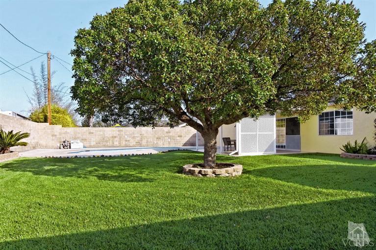 4553 Alpine Street Simi Valley, CA 93063 - Photo 23 of 25 a view of a house with a yard