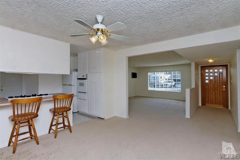 4553 Alpine Street Simi Valley, CA 93063 - Photo 10 of 25 a view of a livingroom with furniture and chandelier fan