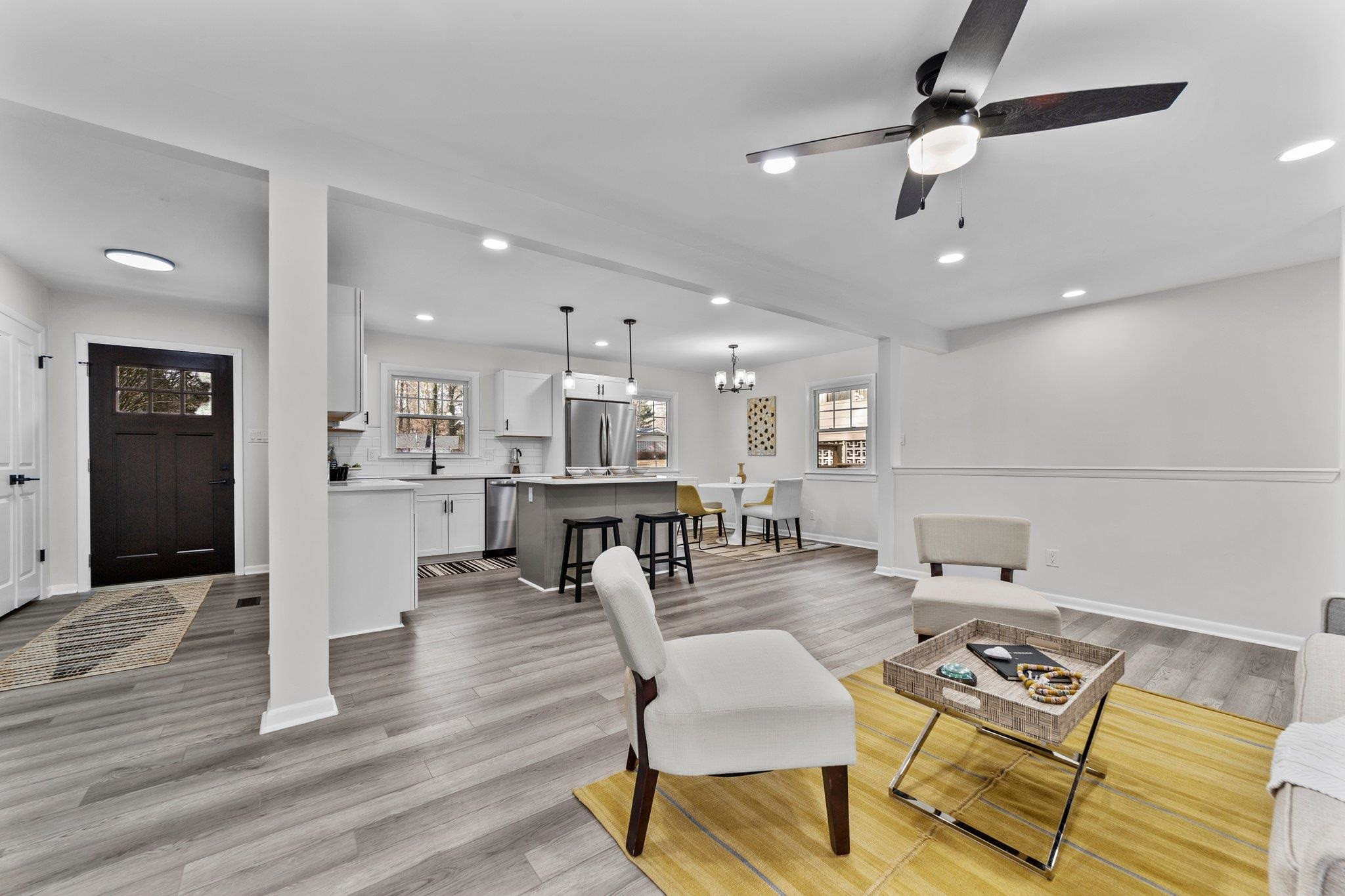 317 Wayne Circle Durham, NC 27707 - Photo 13 of 37 a living room with furniture and kitchen view