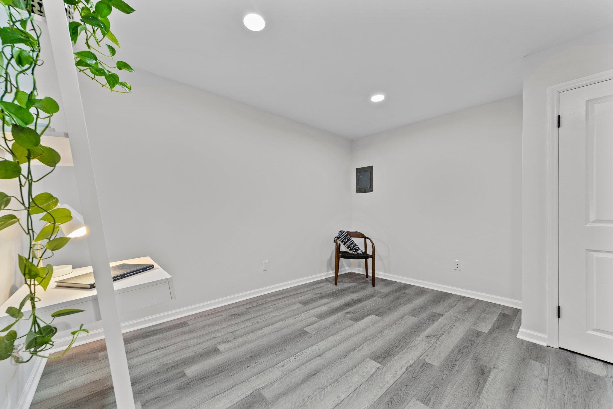 317 Wayne Circle Durham, NC 27707 - Photo 30 of 37 a view of a room with wooden floor and plant
