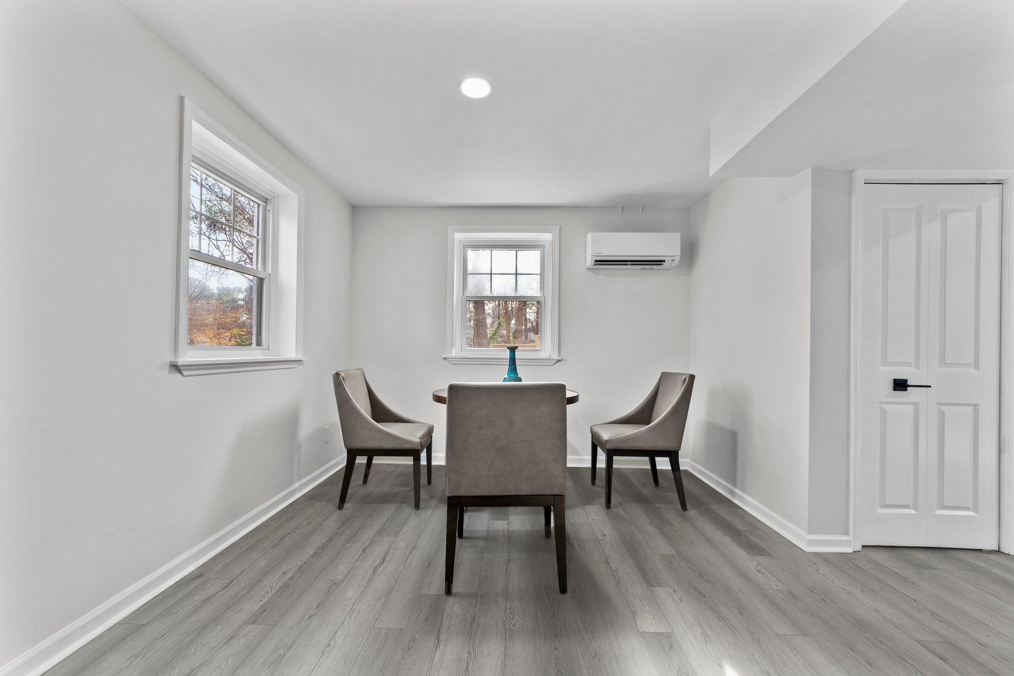 317 Wayne Circle Durham, NC 27707 - Photo 34 of 37 a view of a room with furniture wooden floor and a window