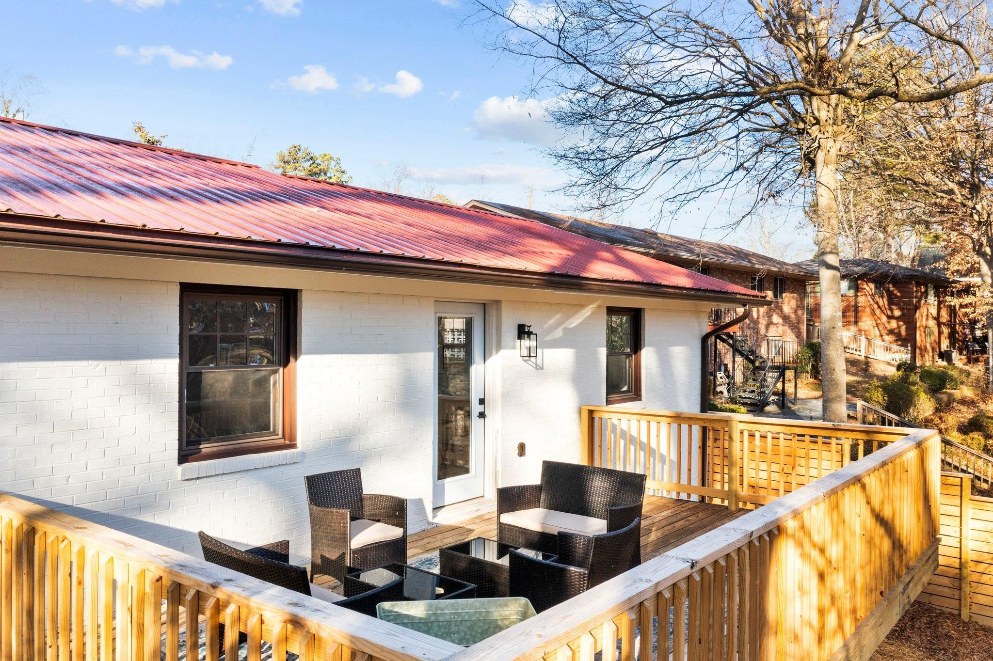 317 Wayne Circle Durham, NC 27707 - Photo 4 of 37 a front view of a house with swimming pool and sitting space