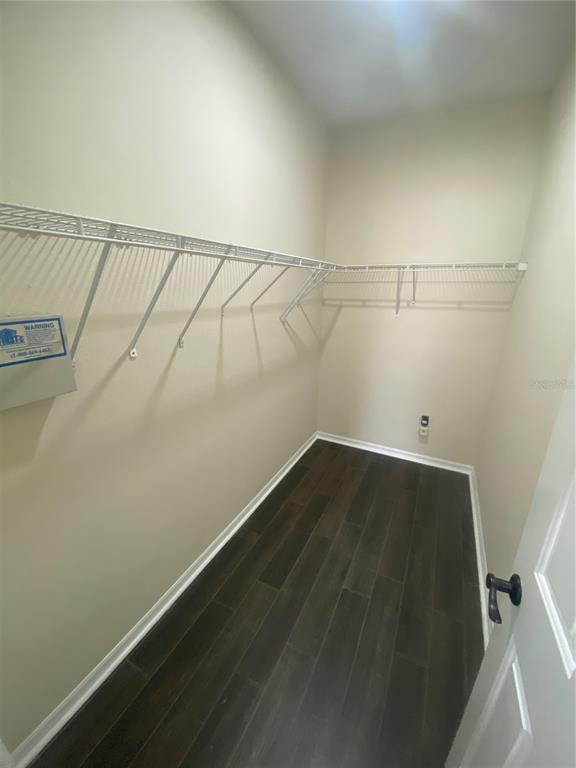 2409 Spring Hollow Loop Wesley Chapel, FL 33544 - Photo 22 of 47 a view of a room with racks on the wall