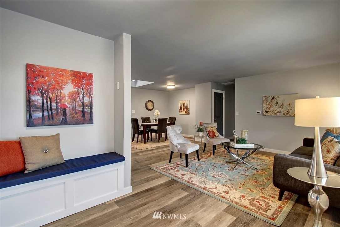 4401 Northeast 10th Street Renton, WA 98059 - Photo 2 of 18 a living room with furniture and a wooden floor