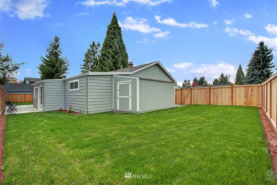 4401 Northeast 10th Street Renton, WA 98059 - Photo 18 of 18 a view of a backyard with garden