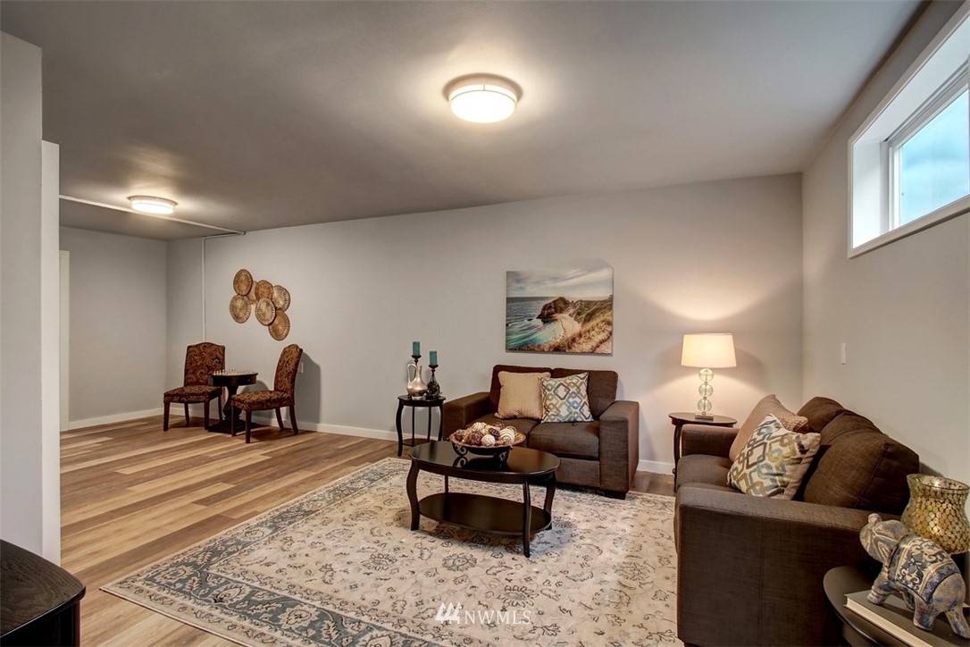 4401 Northeast 10th Street Renton, WA 98059 - Photo 10 of 18 a living room with furniture and a couch