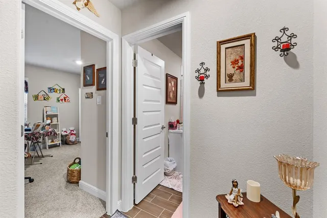 a view of a hallway with workspace