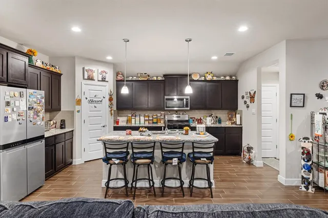 a view of a dining room with furniture