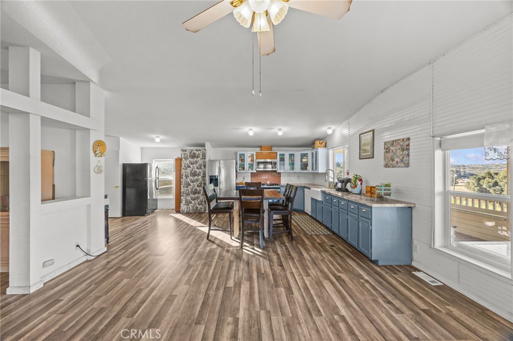 29825 Porth Road Murrieta, CA 92563 - Photo 12 of 40 a living room with furniture and a wooden floor