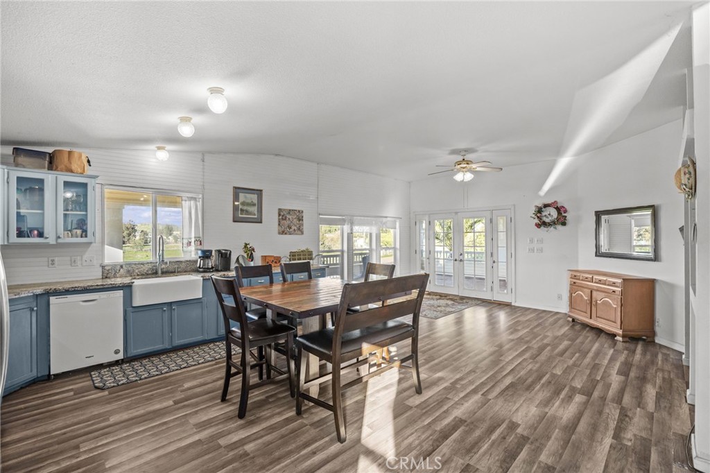 29825 Porth Road Murrieta, CA 92563 - Photo 16 of 40 a view of a dining room with furniture and wooden floor