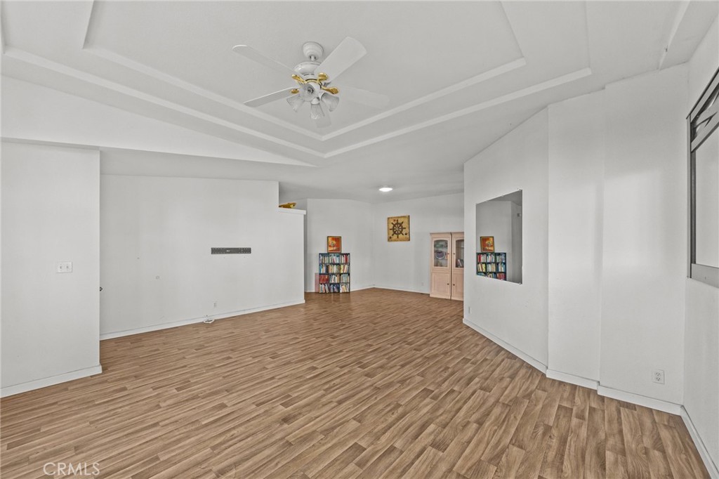 29825 Porth Road Murrieta, CA 92563 - Photo 6 of 40 a view of empty room with wooden floor