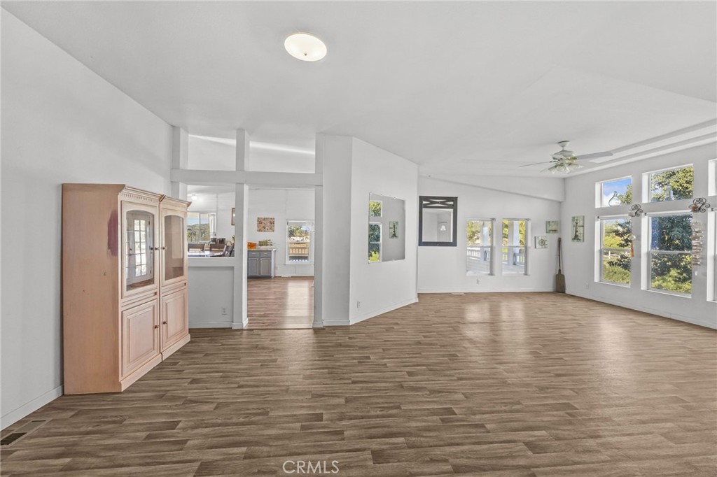 29825 Porth Road Murrieta, CA 92563 - Photo 10 of 40 a view of empty room with wooden floor
