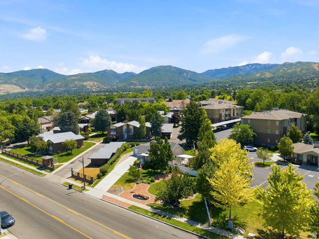 1925 South Main Street Bountiful, UT 84010 - Photo 45 of 48 Expansive aerial perspective showcasing a neighborhood with varied residential structures and abundant mature trees
