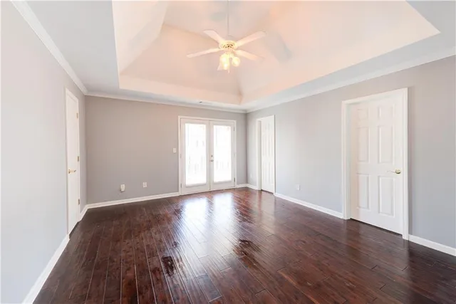a view of balcony with wooden floor and fence