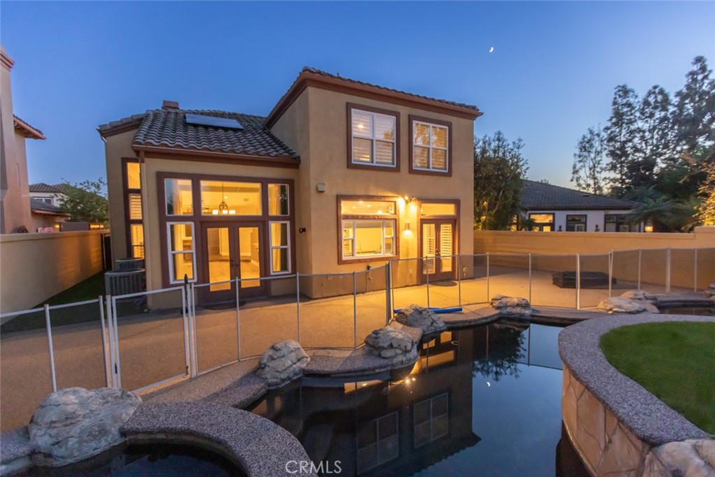 2605 Augusta Tustin, CA 92782 - Photo 16 of 44 a outdoor space with patio furniture and a potted plant