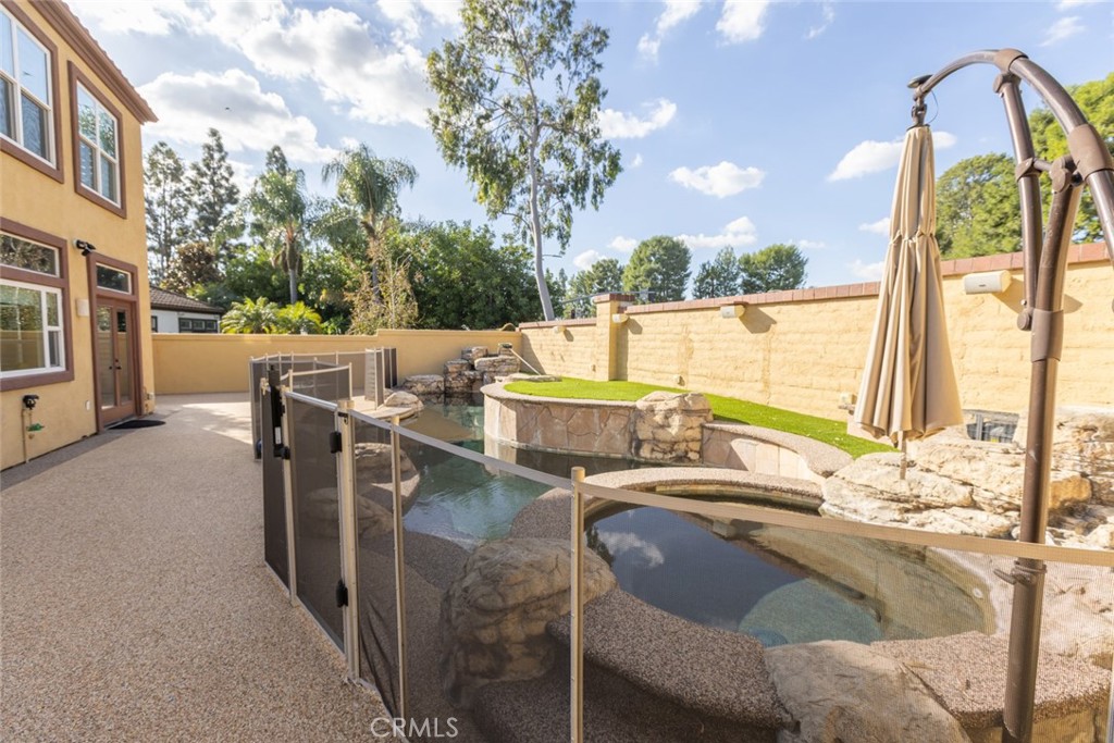 2605 Augusta Tustin, CA 92782 - Photo 18 of 44 a view of balcony with furniture and outdoor kitchen