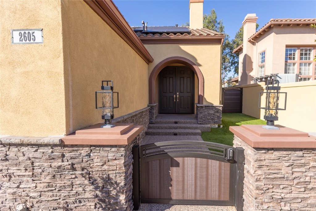 2605 Augusta Tustin, CA 92782 - Photo 42 of 44 a front view of a house with a fireplace