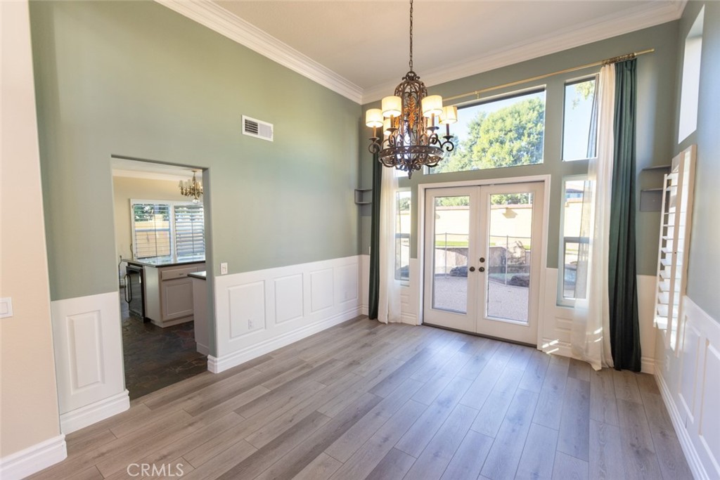 2605 Augusta Tustin, CA 92782 - Photo 9 of 44 a view of a big room with wooden floor and windows