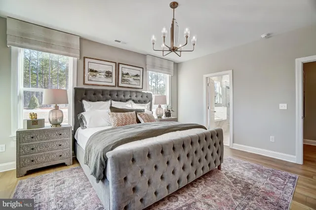 a bathroom with double sink and a mirror