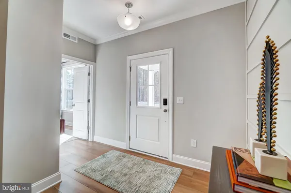a view of livingroom with furniture and wooden floor