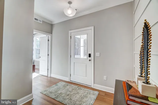 a view of livingroom with furniture and wooden floor