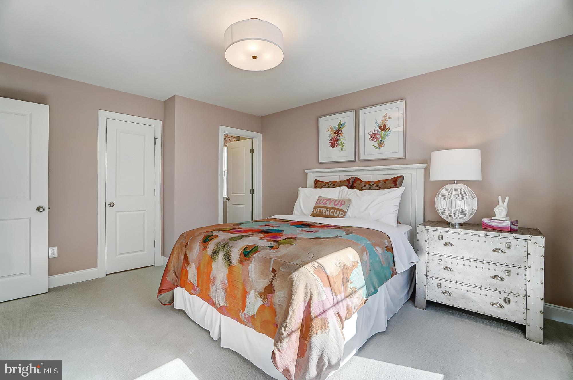 14925 Abelia Court Issue, MD 20645 - Photo 21 of 42 a bedroom with a bed and painting on the wall