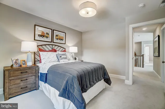 a bed room with furniture and a window