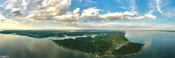 a view of a lake from a yard