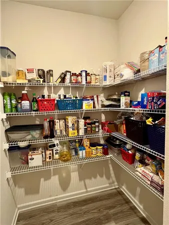 a bathroom with a sink toilet and mirror