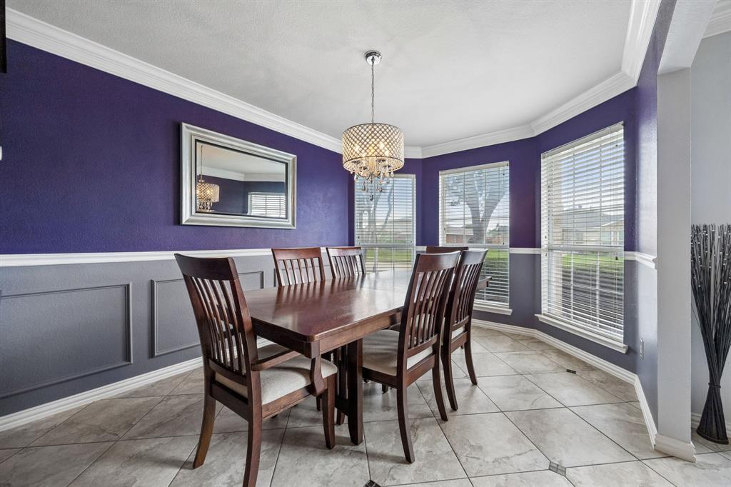 545 Rothschild Lane Murphy, TX 75094 - Photo 11 of 27 Elegant dining room with high-end crystal chandelier for elevated experience