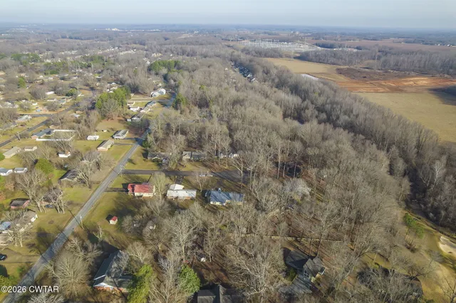 a view of a wooden fence