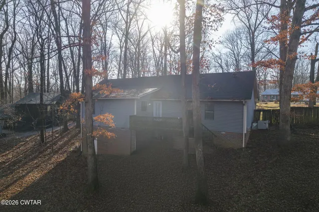 a view of a backyard of the house