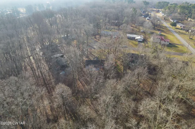 a house with trees in front of it