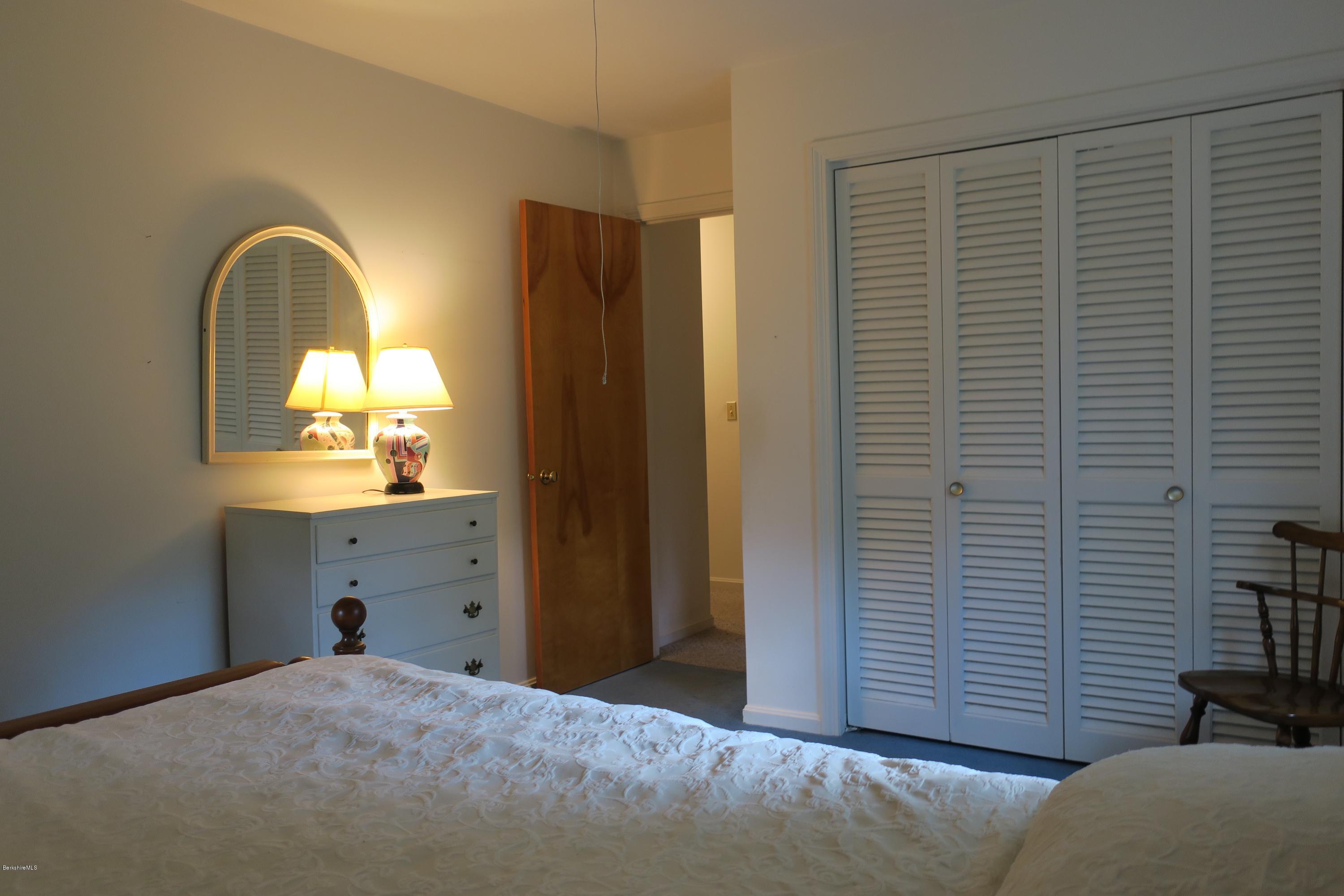 375 Devon Road Lee, MA 01238 - Photo 12 of 23 a bedroom with a bed and a dresser