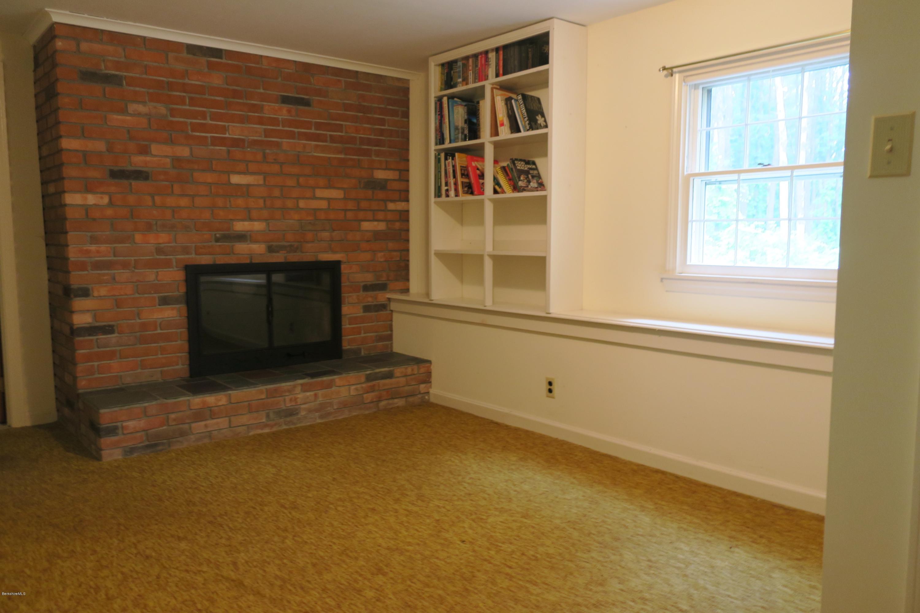 375 Devon Road Lee, MA 01238 - Photo 15 of 23 a view of empty room with windows