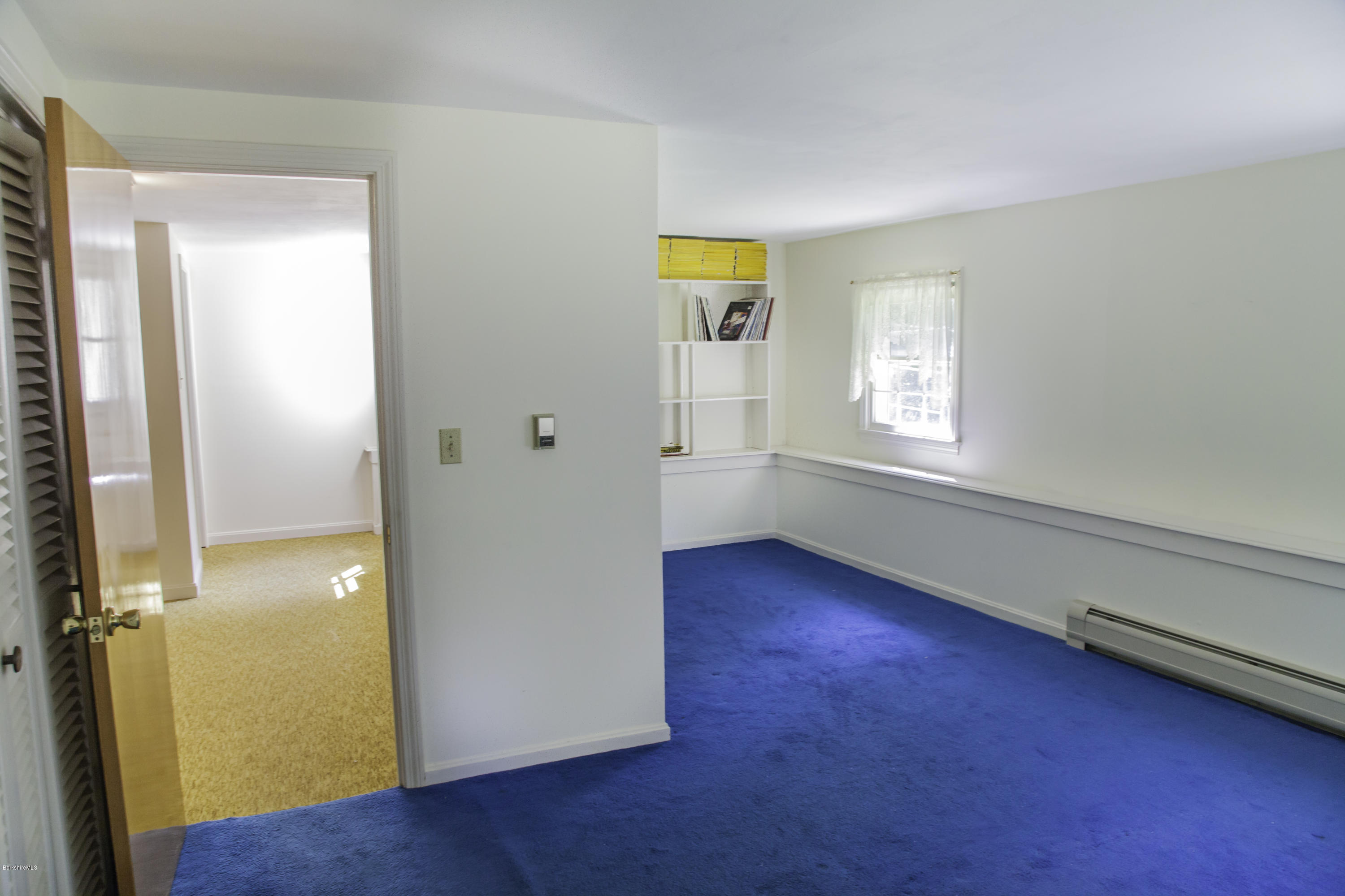 375 Devon Road Lee, MA 01238 - Photo 16 of 23 an empty room with window and wooden floor