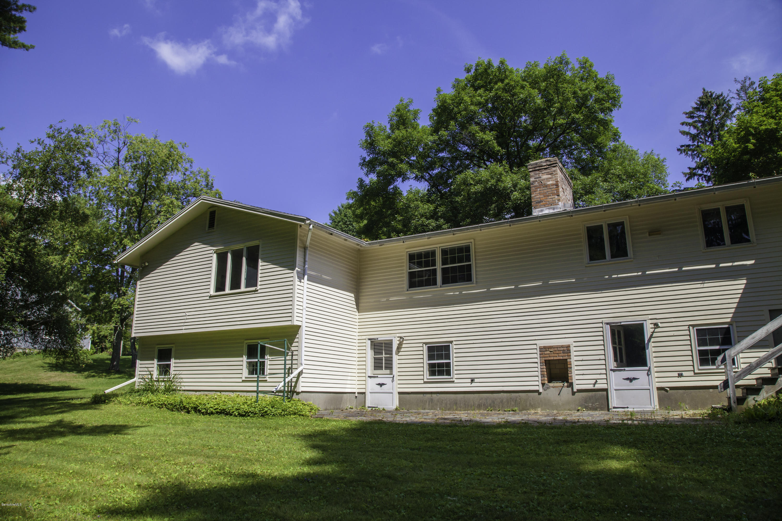 375 Devon Road Lee, MA 01238 - Photo 23 of 23 a front view of house with yard and green space