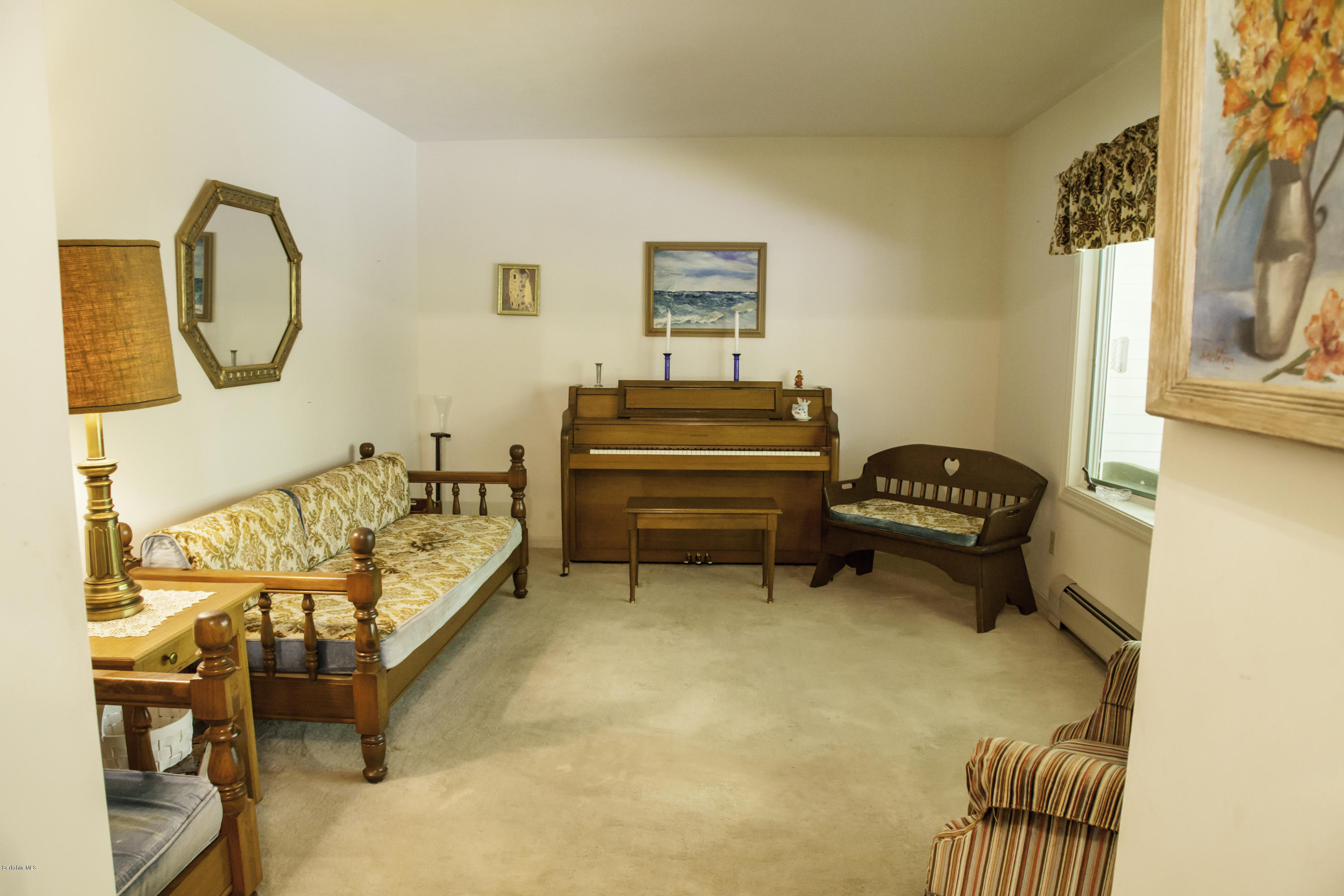 375 Devon Road Lee, MA 01238 - Photo 4 of 23 a bedroom with furniture and a window