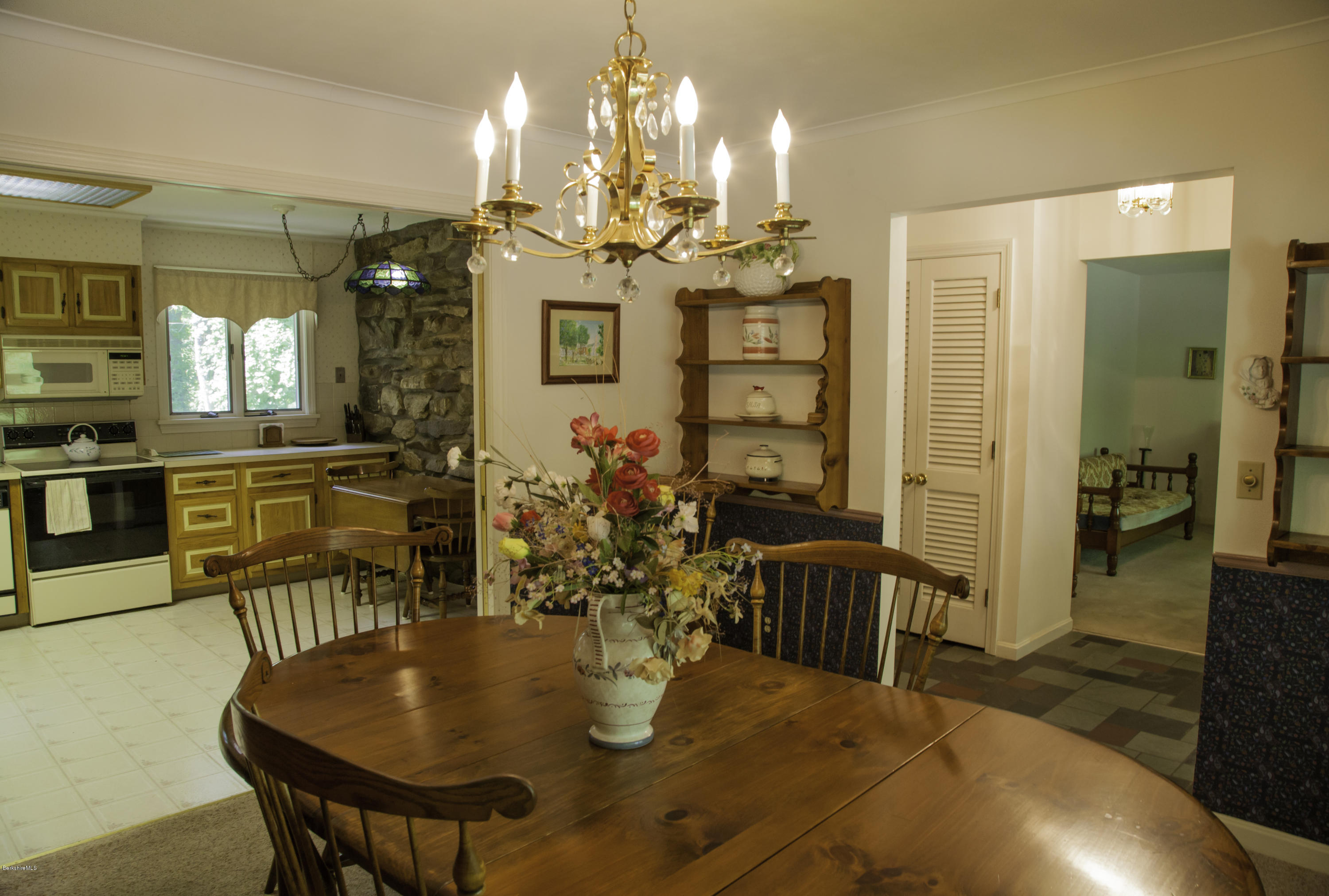 375 Devon Road Lee, MA 01238 - Photo 5 of 23 a view of a dining room with furniture and wooden floor