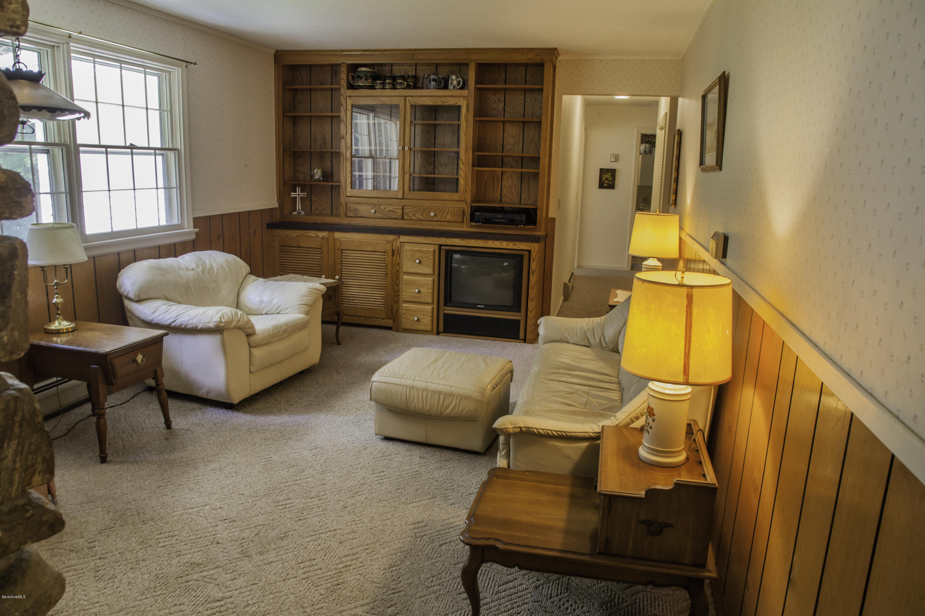 375 Devon Road Lee, MA 01238 - Photo 9 of 23 a living room with furniture and a flat screen tv